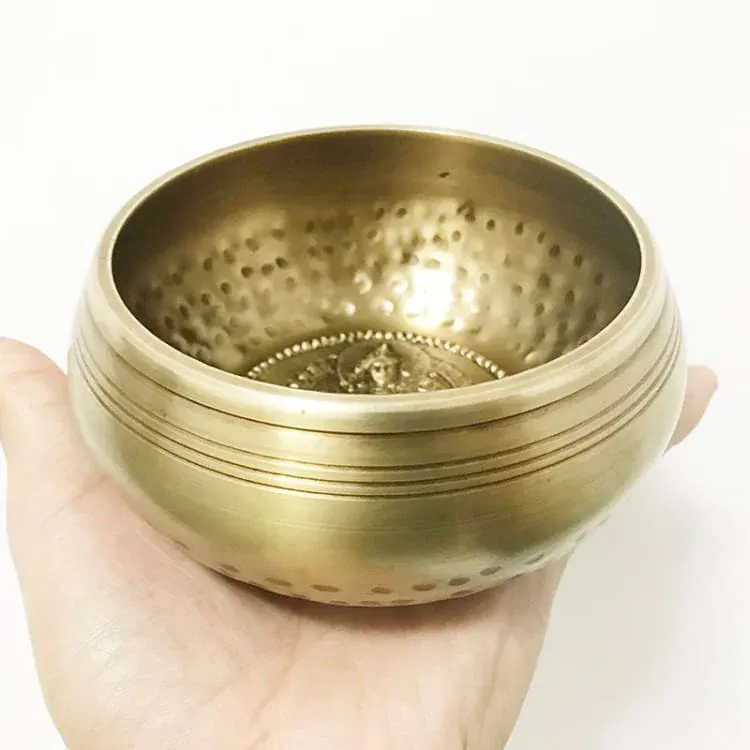 Bol tibétain chantant avec motif de bouddha en fond – Image 3